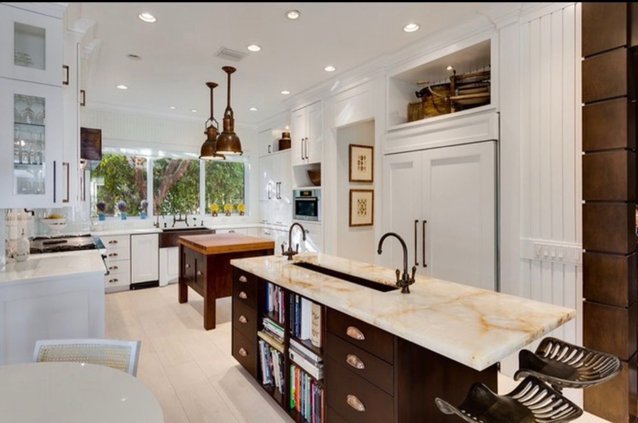 Open kitchen with custom island and cabinetry