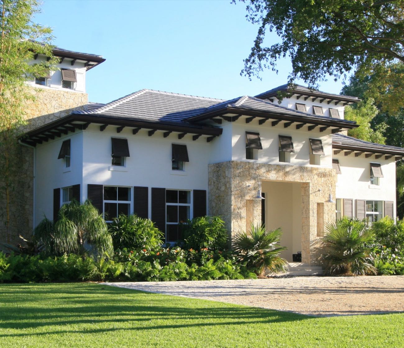 Custom home set among mature landscaping